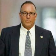 Christopher Hare, MBA from Loyola Financial LLC 
