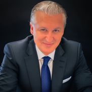 Dino Dionne from Genesis Capital Group, LLC