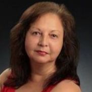 Leslie Guzman from REALTY EXPERTS