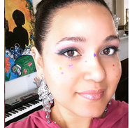 Elizabeth Del Rosario-Baker from Creative Share Group