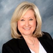 Mary Gustafson from One Oak Realty Corp