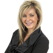 Laura Zervas from Coldwell Banker Woodland Schmidt 
