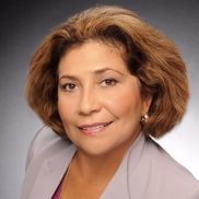 Martha Lopez-Elkind from Keller Williams Capital Properties