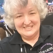 Laura Reynolds from Fluff and Ruffles Quilting Services